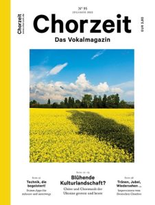 Chorzeit Nr. 95 (Juli/August 2022) Ein leuchtend gelbes Rapsfeld erstreckt sich unter blauem Himmel mit weißen Wolken. Die Themen sind Kulturlandschaft, Technik und Chorfest-Emotionen.